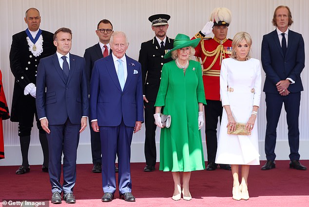 French President Emmanuel Macron, King Charles, Queen Camilla and Brigitte Macron on the Royal Dais on Datchet Road in Windsor today