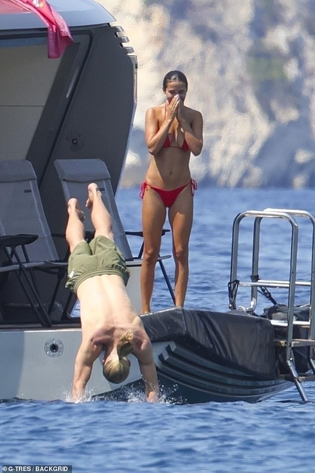 Haaland wasn't afraid to cool down as he went in and out of the ocean near to their yacht