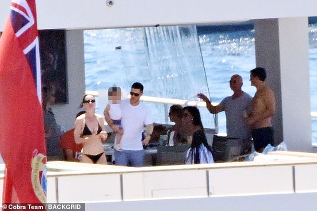 After much speculation about their split, the couple were seen soaking up the sunshine during their summer family holiday