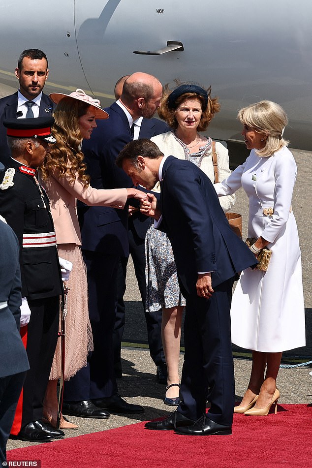 Emmanuel and Brigitte Macron are greeted by William and Kate at RAF Northolt this morning