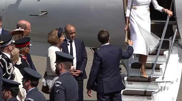 Mr Macron disembarked the aircraft first today, before being followed by his wife Brigitte