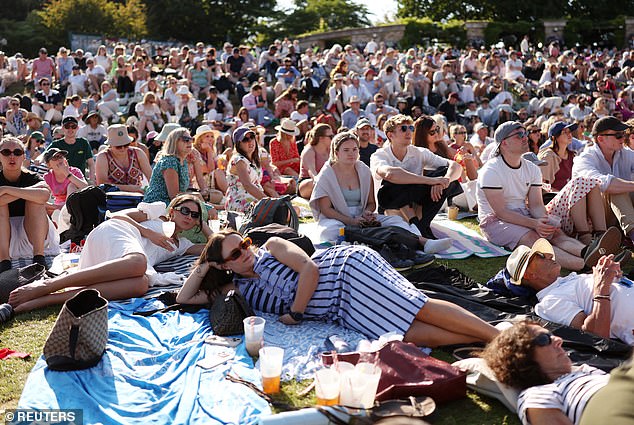 Fans flocked to Wimbledon's famous Henman Hill to watch Norrie take on Alcaraz on Tuesday