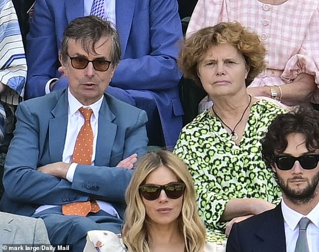 The TV producer was joined by her long-time friend and journalist Robert Peston, as they were photographed chatting away in the star-studded Royal Box today