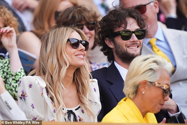 Also spotted in SW19 on Tuesday was Sienna Miller as the Layer Cake actress put on a very loved-up display with her boyfriend Oli Green