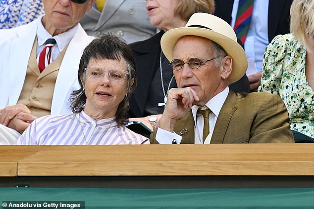 Completing the look with a raffish hat, the celebrated actor, 65, appeared to be in high spirits while posing for photos alongside artist and documentary photographer Lisa Barnard