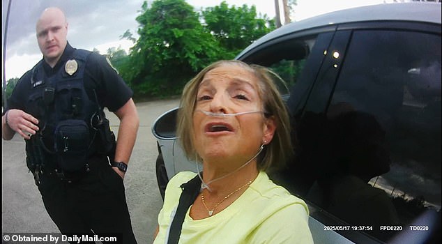 When the Olympian was handcuffed and told that she was under arrest, she exclaimed 'No I'm not', before protesting and getting emotional as they led her to the car