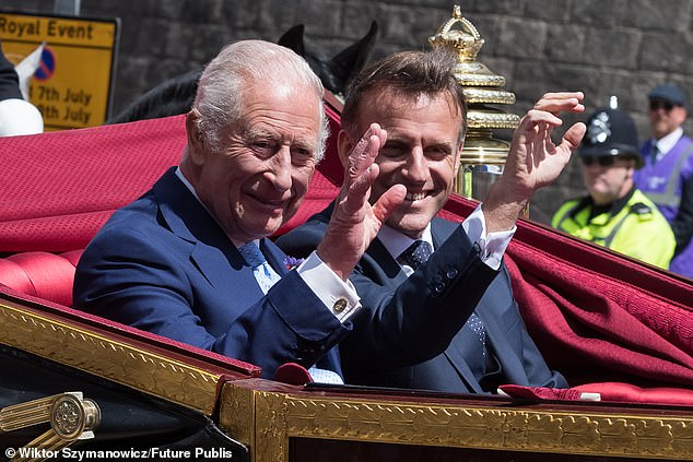 King Charles III and Emmanuel Macron travel in a 1902 State Landau through Windsor today