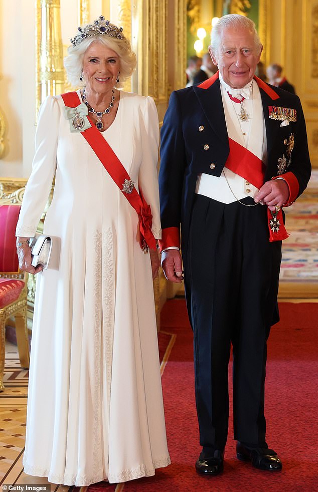 Queen Camilla was the image of sophistication in an all-white gown for the event in Windsor this evening