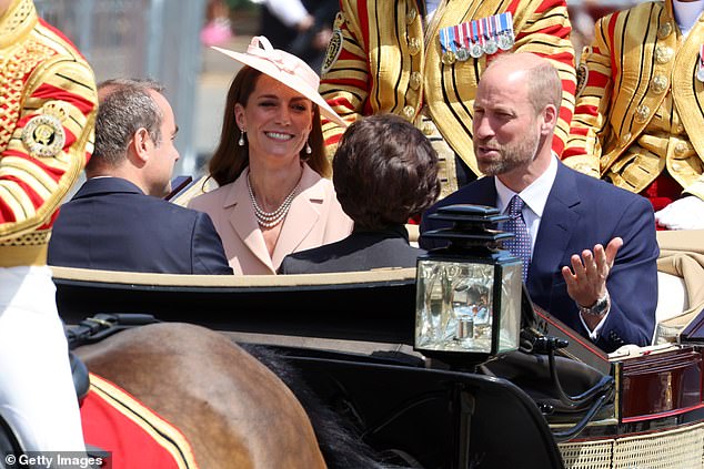 The Prince and Princess of Wales during the carriage procession to Windsor Castle today