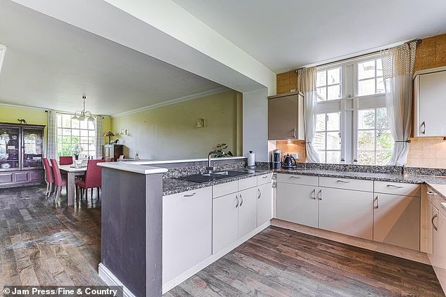 They add: 'The open-plan kitchen/diner connects living, dining and even entertainment areas, fostering a sense of connectivity'