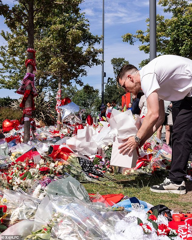 Liverpool defender Andrew Robertson also laid flowers outside Anfield on Tuesday afternoon