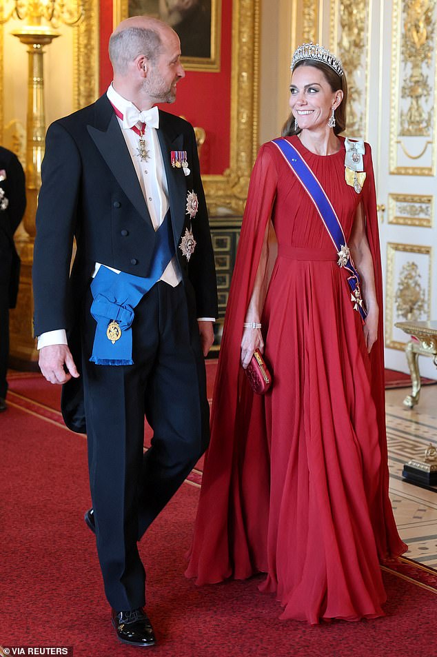 The Prince and Princess of Wales share a loving look as they walk side-by-side during the State Banquet last night