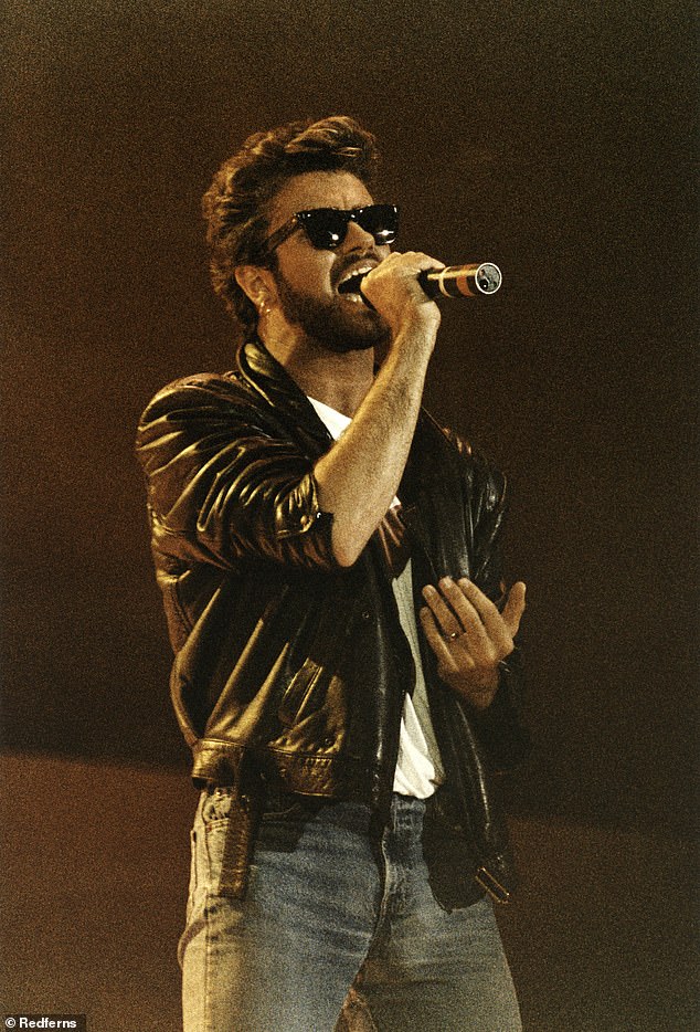George Michael performing on stage at Live Aid with Wham!