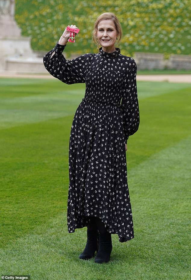 Alison Moyet, poses after being made an MBE by the Princess Royal during an investiture ceremony at Windsor Castle on March 30, 2022