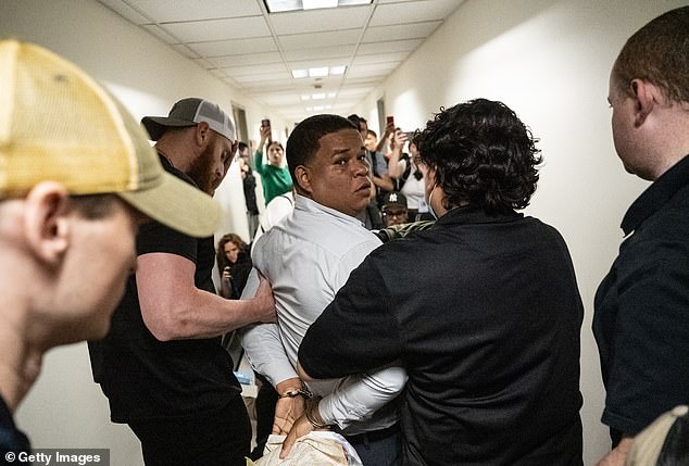 An immigrant is detained by ICE agents as he exits an immigration courtroom hearing at the Jacob K. Javitz Federal Building on June 6, 2025 in New York City. Federal agents are arresting immigrants outside of immigration court hearings, as ICE ramps up enforcement