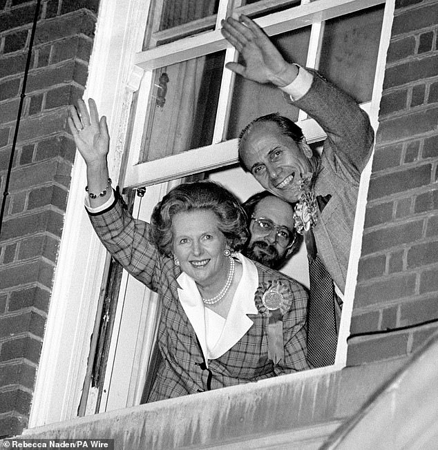 Prime Minister Margaret Thatcher and party chairman Norman Tebbit wave to the crowds from Conservative Central Office, Smith Square, after being elected to a third term of government