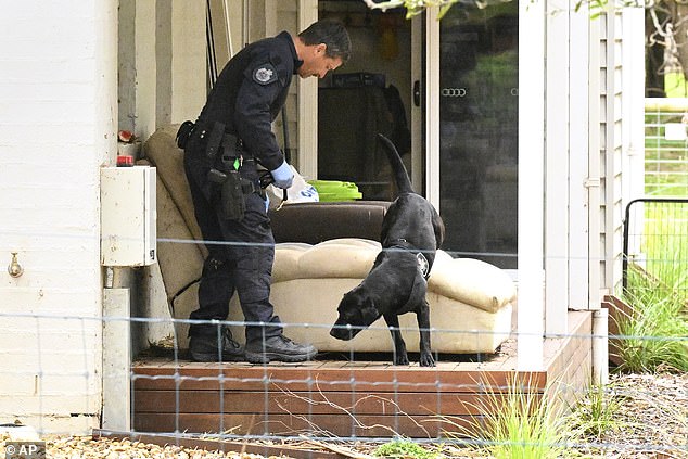 Police searching the home of Erin Patterson during their initial investigations into the deaths