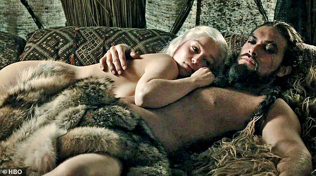 Reflecting on starring on the HBO show, Sophie quipped that she got her sex education lessons from watching the graphic scenes filmed on set (pictured: Emilia Clarke and Jason Mamoa)