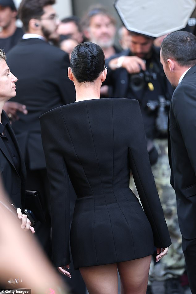 She wore a boxy black dress