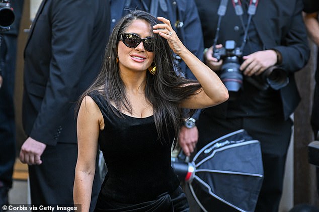 The actress added dark shades to her look