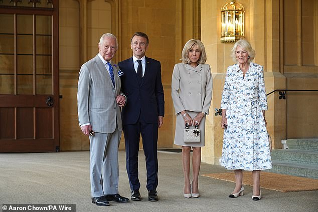 The King, Mr Macron, Mrs Macron and the Queen pose for a photograph before they part ways