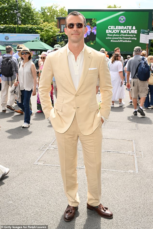 The actor was all smiles as he met with Netflix star Luke, who wore a stylish matching suit
