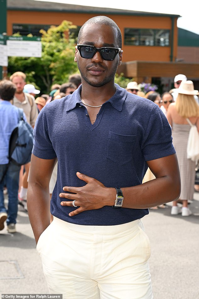 Ncuti showed off his muscular physique in a figure-hugging navy polo and white trousers