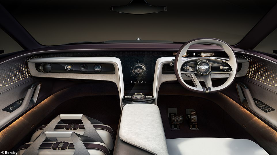 The dashboard blends physical and digital interfaces in what it dubs a 'Magical Fusion' of knurled dials - including the start button in the centre console - and a trio of screens