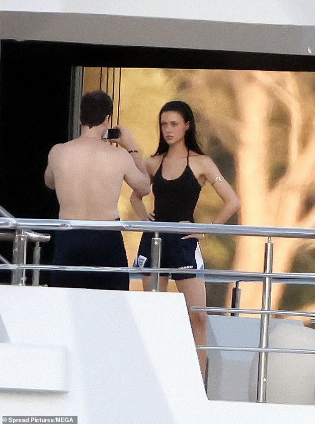 The couple were clearly keen to document the outfit, as Nicola was spotted posing up a storm while Brooklyn snapped pictures of her in the shorts