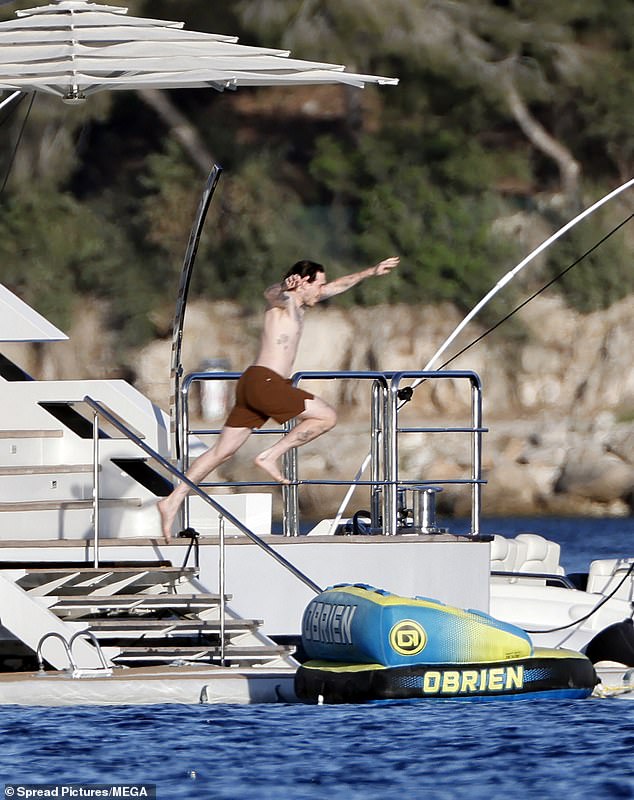 He couldn't get enough of the water as he kept off the boat into the sea