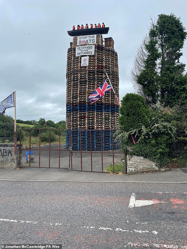 A sign saying 'Stop the boats' was also attached to the pyre in Moygashel, on the outskirts of Dungannon in Co Tyrone in Northern Ireland