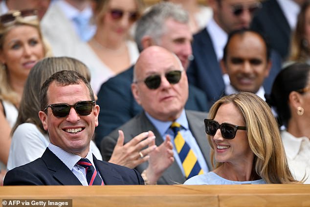 Today, the duo, who are watching the match unfold from the Royal Box alongside Queen Camilla , appeared to be sweetly loved-up as they held their arms around each other for photographers on day ten of the championships