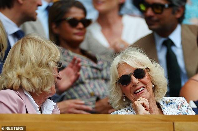 Camilla attended Wimbledon today, with her sister, and looked delighted as she took in the action from the Royal Box