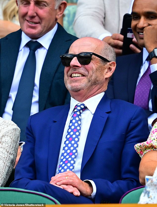 In a dotty tie and wearing a striking blue suit, BBC newsman Nick Robinson appeared to be enjoying his afternoon watching the quarter-finals at Wimbledon