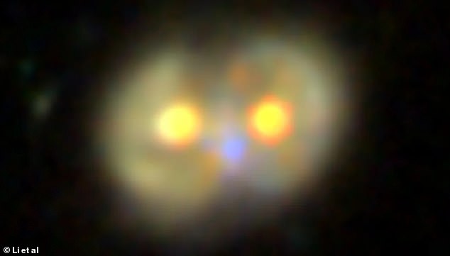 Taking a closer look at the image, the orange blobs at the centre are the incredibly luminous 'active galactic nucleus' (AGN)