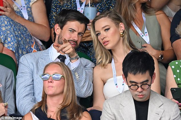 Jack Whitehall, 37, and his fiancée Roxy Horner, 34, appeared completely focused during the match