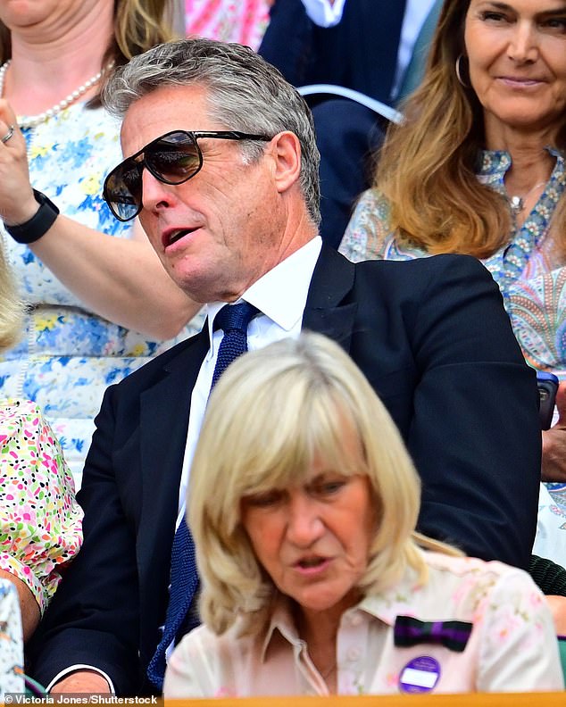 Hugh enjoyed a day out at day 10 of Wimbledon with fellow guests in the royal box