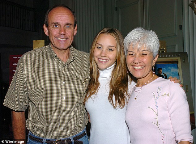 Amanda pictured with her parents Rick and Lynn Bynes