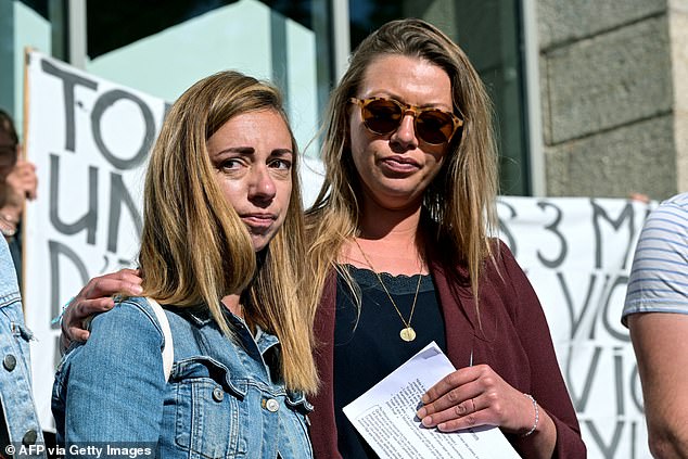 Survivors staged a protest outside the court in Vannes, holding signs such as 'Never again' and 'I accuse you' earlier this month