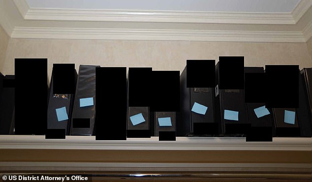 Exhibits shown in court at Ghislaine Maxwell's 2021 trial included shelves of labeled binders found at the house