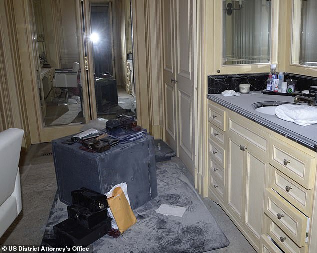 Another image, of what appears to be a dressing room in the home, shows a large safe that was found containing a large amount of cash and passports
