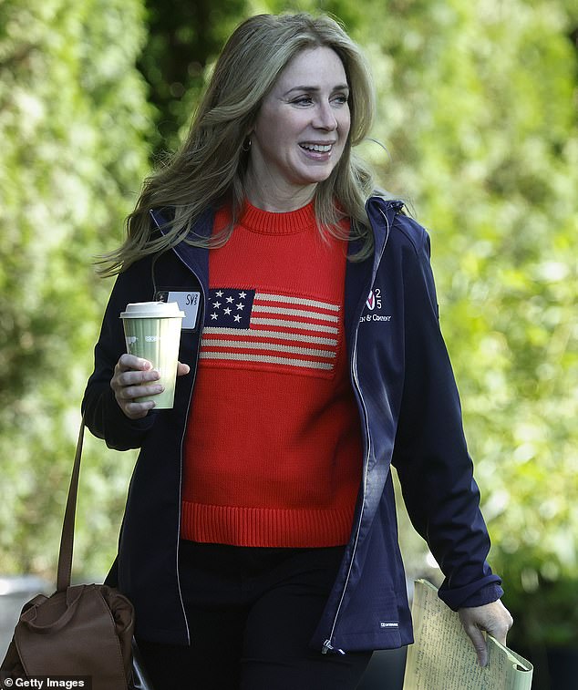 Affordable and cute! Journalist Becky Quick showed off her patriotic side on the second day of the retreat on Wednesday, as she donned a $198 red American flag sweater from Tuckernuck. She paired it with a sleek navy blue waterproof jacket and a fresh blowout