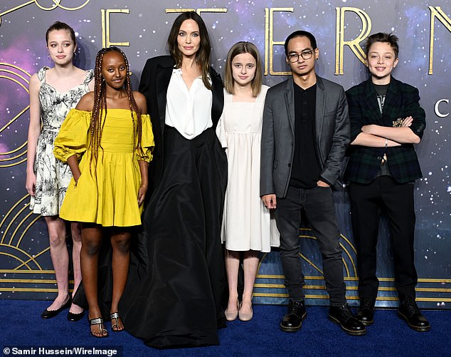 Angelina pictured with five of her six children in October 2021; L-R Shiloh, Zahara, Angelina, Vivienne, Maddox, and Knox
