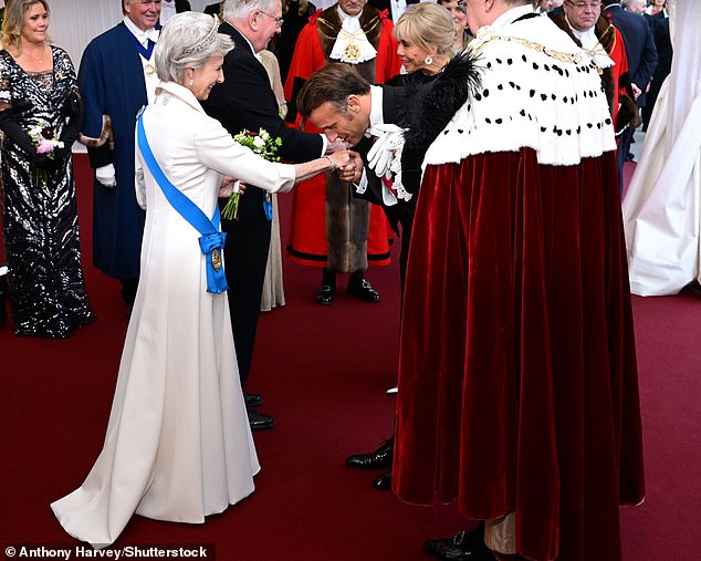 The opulent celebrations in Guildhall were attended by the Duke and Duchess of Gloucester, who warmly greeted Emmanuel Macron and his wife Brigitte