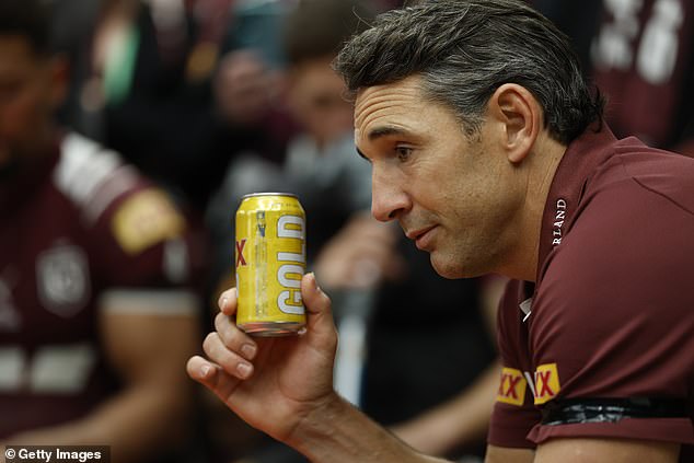 Billy Slater (pictured) led his Maroons team as they paid tribute by raising their post-game beers to Cameron Munster's dad, Steven, who passed away last week
