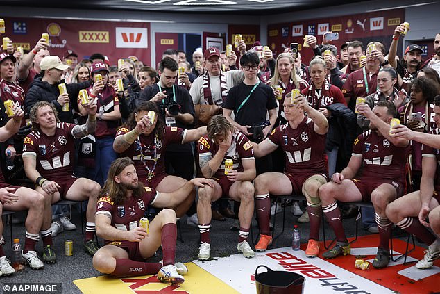 In a touching moment, the Maroons raised their beers for Munster's father in the changing room