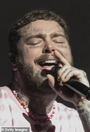 Post Malone is pictured above in 2021