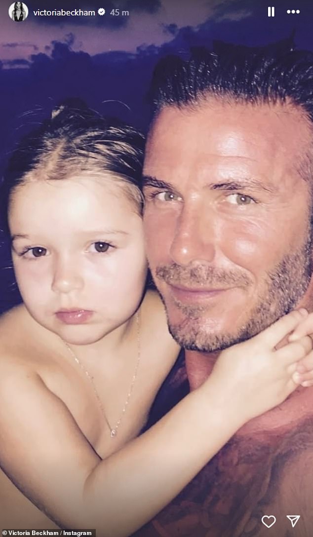 The fashion designer shared anb adorbale photo of her husband David cradling his daughter as a baby