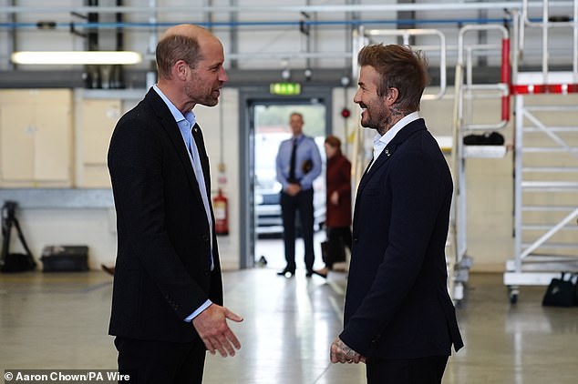 William speaks with Beckham as he arrives for a visit to RAF Northolt to view the two new London Air Ambulance Charity helicopters in October 2024