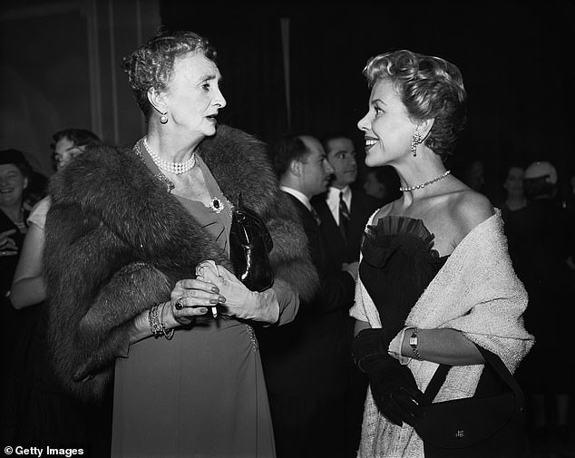 Irene Mountbatten, Marchioness of Carisbrooke talking with British actress Helene Cordet, October 1953